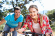 Young couple on country bike ride