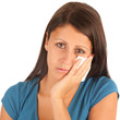 Isolated portrait of an attractive young woman suffering from to