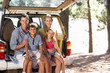 Young family on day out in country