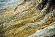 A close up of the surface of the grey stone.