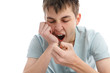 Yawning tired or bored boy