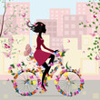 Girl on a bicycle in the city