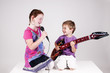 two kids making music