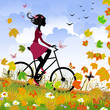 Girl on bike outdoors in autumn