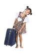 happy Asian girl with heavy luggage