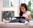 Child Using Digital Tablet