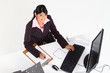 overhead view of young businesswoman in office