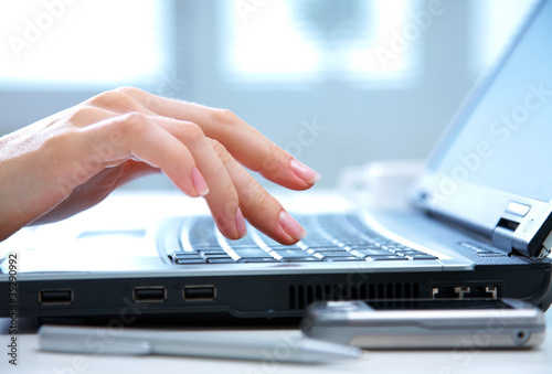 Photo: using laptop using laptop