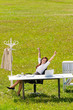 Businesswoman stretch sunny meadow nature office
