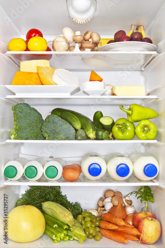 Photo: Full fridge. Healthy fitness concept. Full fridge. Healthy fitness concept.