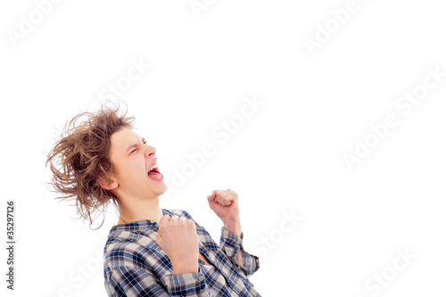 Photo: Portrait of funny young man with awesome hairdo isolated on whit Portrait of funny young man with awesome hairdo isolated on whit