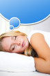Portrait of young beautiful sleeping woman on bed at bedroom