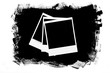 Photo frames over grunge black background