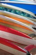 Brightly Colored Rental Surfboards Laying on the Sand in Hawaii Brightly Colored Rental Surfboards Laying on the Sand in Hawaii