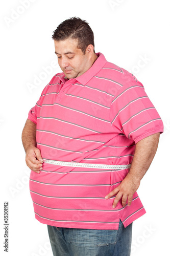 Foto: Fat man with a tape measure Fat man with a tape measure