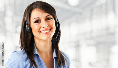 Photo: Smiling call center operator Smiling call center operator
