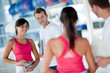 Gym woman with her trainer