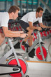 Man doing spinning at the gym