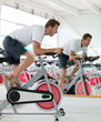 Man doing spinning at the gym
