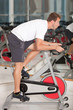 Man doing spinning at the gym