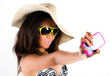 Foto: Beautiful young brunette woman in cowboy hat, shades Beautiful young brunette woman in cowboy hat, shades
