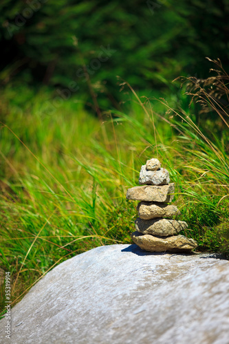 Photo: Small stone Zen tower on the rock Small stone Zen tower on the rock