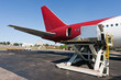 Loading cargo plane Loading cargo plane