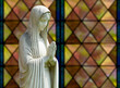 Photo: Isolated statue of Mary against window Isolated statue of Mary against window