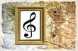 Photo: Texture - muro vecchio, cornice e chiave di violino Texture - muro vecchio, cornice e chiave di violino