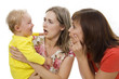 Mother and the aunt have fun together with the child
