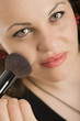 woman applying make-up