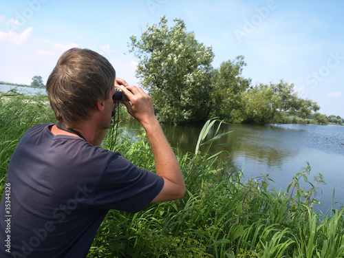Photo: Birdwatching in beautiful nature. Birdwatching in beautiful nature.