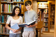 Beautiful students with a book