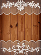 wooden background with lace frame