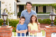Father and children outside home