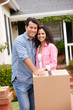 Hispanic couple moving into new house