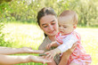 Teenager with a baby in her arms
