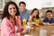 Photo: Hispanic family eating breakfast Hispanic family eating breakfast