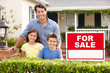 Father and children outside home for sale