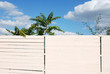 abstract wooden fence with some clouds