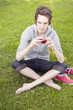 Young man holding an apple Young man holding an apple