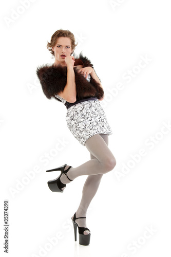 Photo: gay man attractive she-male makeup with dress and platform shoes gay man attractive she-male makeup with dress and platform shoes