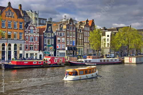 Photo: Classical Amsterdam view. Urban scene. Classical Amsterdam view. Urban scene.