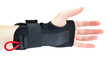 Wrist support with hand isolated on white.