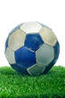 old ball on the grass