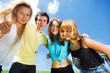 Girls and a guy embracing