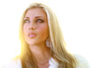 beautful blonde lady looking skywards