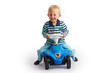 Photo: Kleinkind fährt mit dem Bobby Car Kleinkind fährt mit dem Bobby Car
