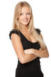 Portrait of smiling female standing with folded hands