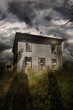 Old ababdoned house with flying ghosts